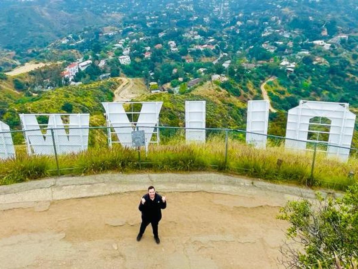 a man taking a hollywood sign hike with bikes and hikes la
