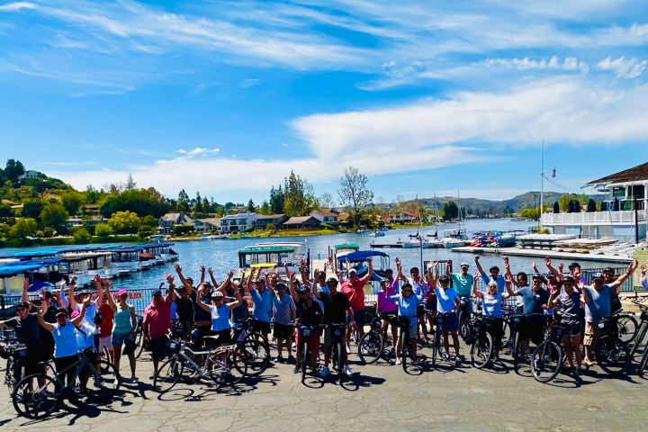 a group of people riding bikes on a westlake bike tour