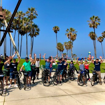 a group of people riding bikes