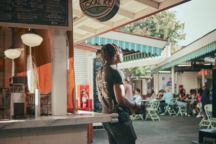 a man riding a skateboard up the side of a building