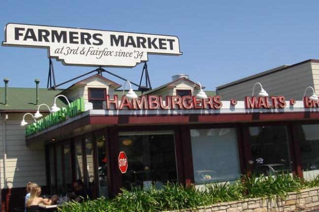a sign in front of a building