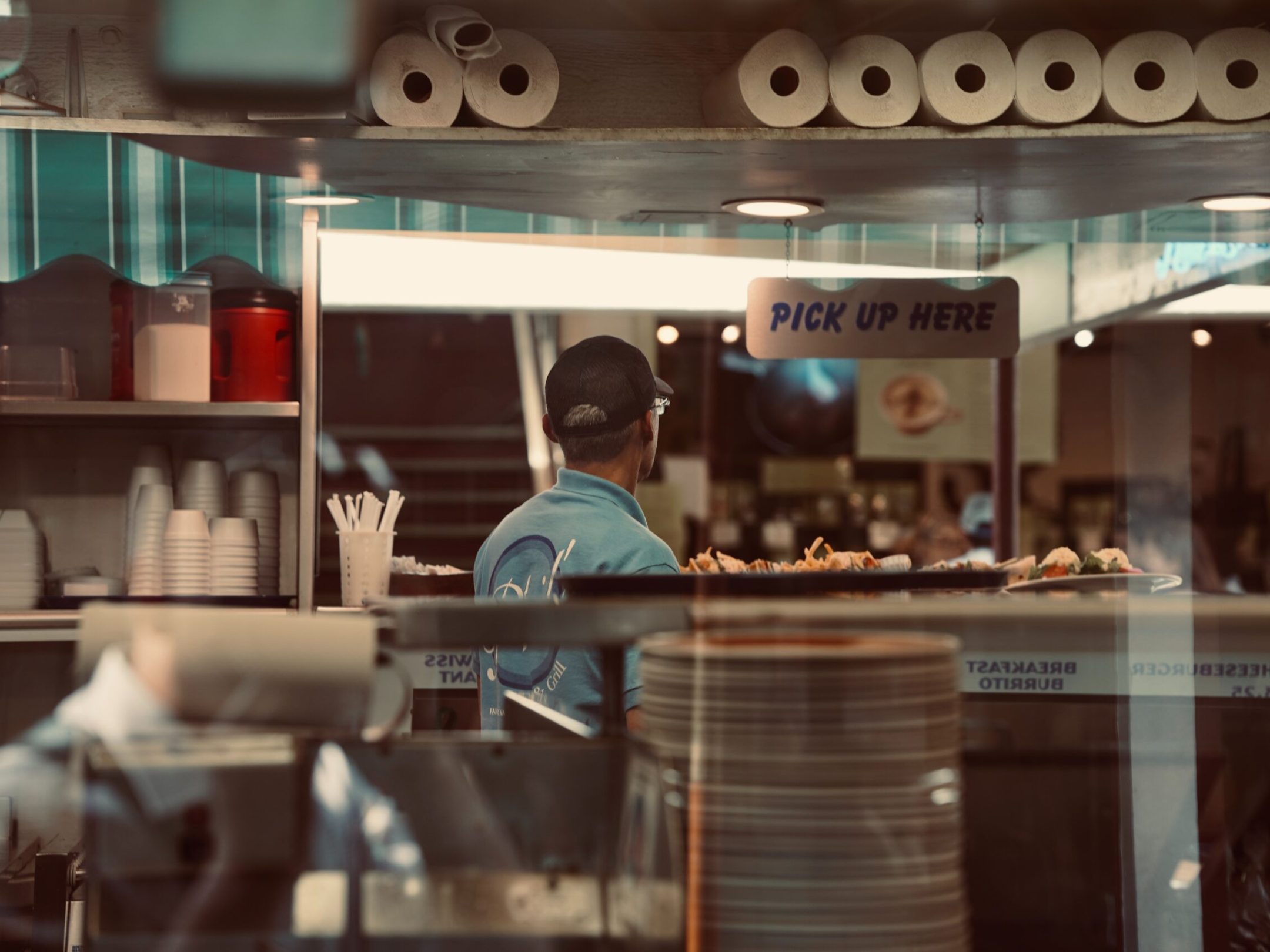 a man standing in front of a store
