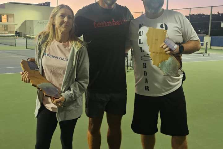 a group of people posing for the camera