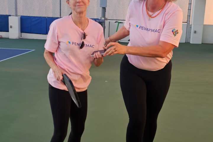 a group of people posing for the camera