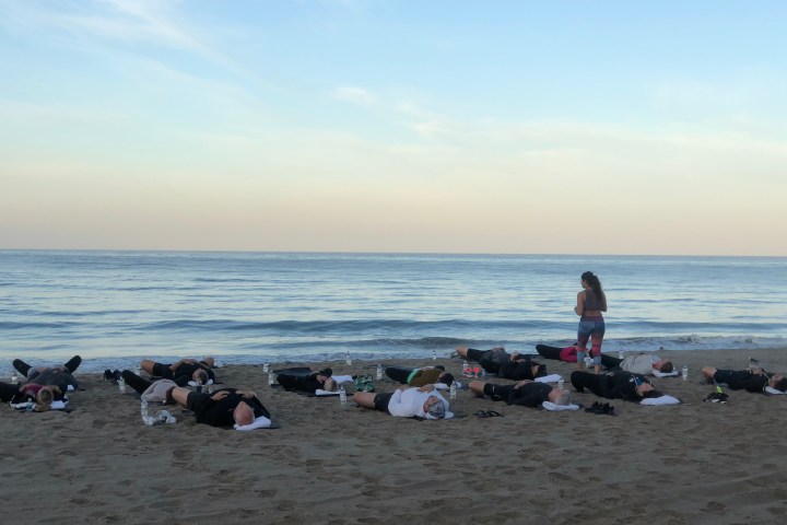 a group of people on a beach